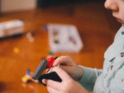 A child playing with Lego