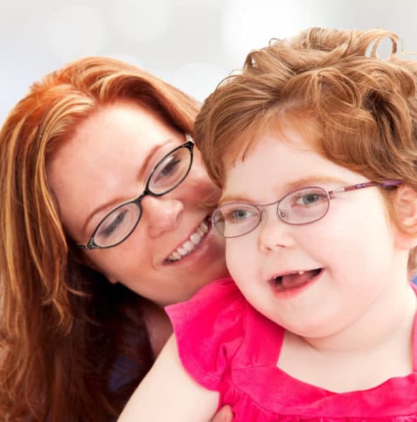 woman smiling with young girl