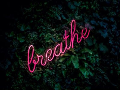 The word 'Breathe' set against a dark background