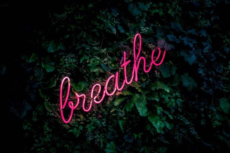 The word 'Breathe' set against a dark background