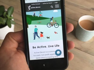 a smartphone showing the Active Devon live chat feature