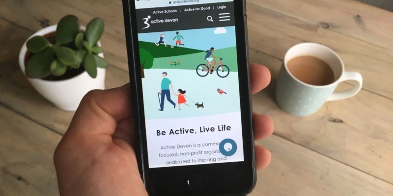 a smartphone showing the Active Devon live chat feature