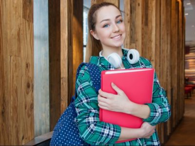 a female student holding a folder