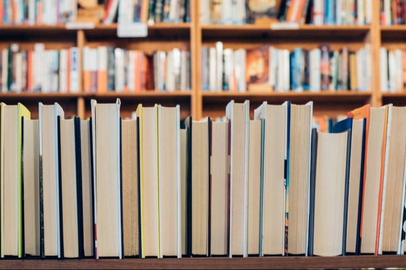 a bookshelf full of books