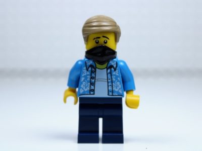 a Lego figure wearing a face mask