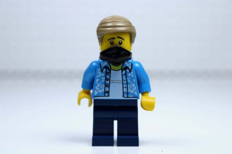 a Lego figure wearing a face mask