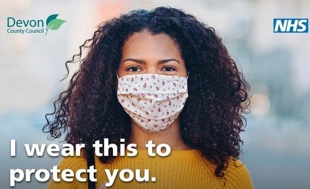 a woman wearing a face mask. The wording says: I wear this to protect you.