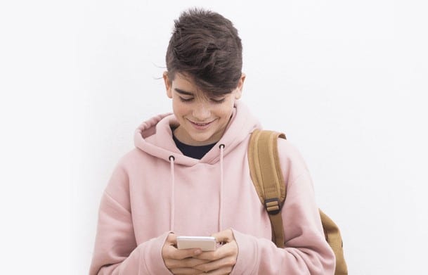 a young person using a mobile phone