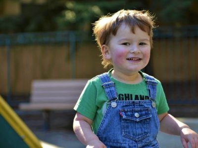 an autistic boy smiling