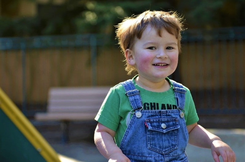 an autistic boy smiling