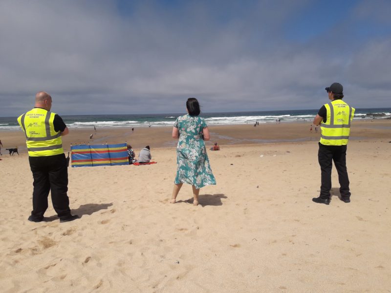 Safer Summer street marshals on watch at a beach