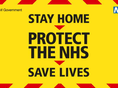 A poster stating stay home, protect the NHS, save lives