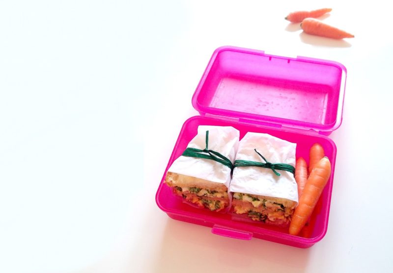 sandwiches and carrots in a lunchbox