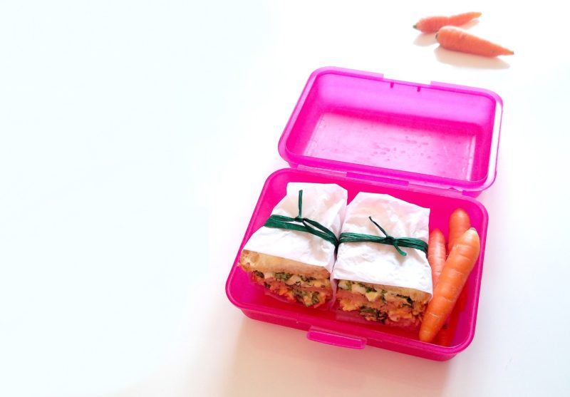 sandwiches and carrots in a lunchbox