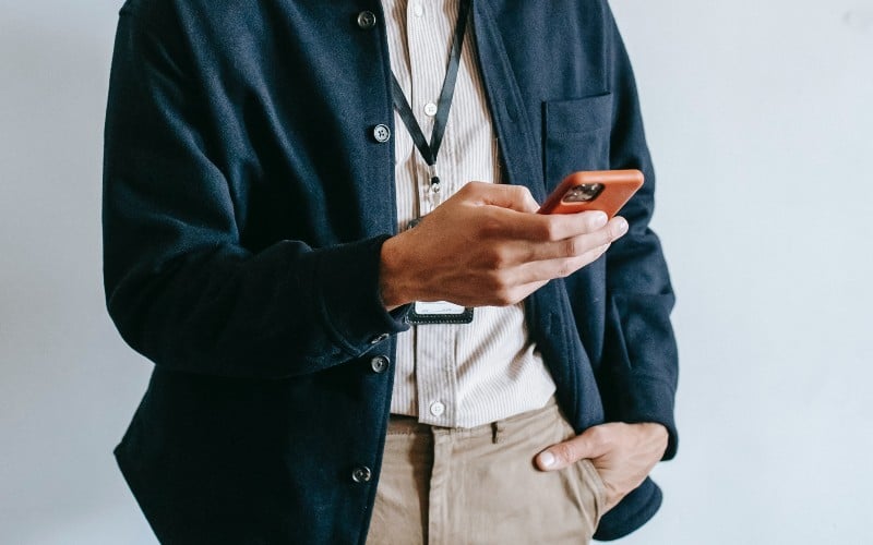 a person using a mobile phone