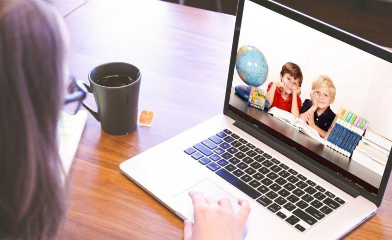 a woman using a laptop