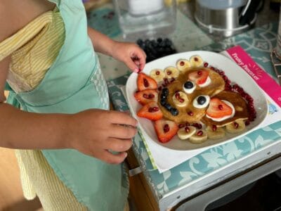 a child making pancakes