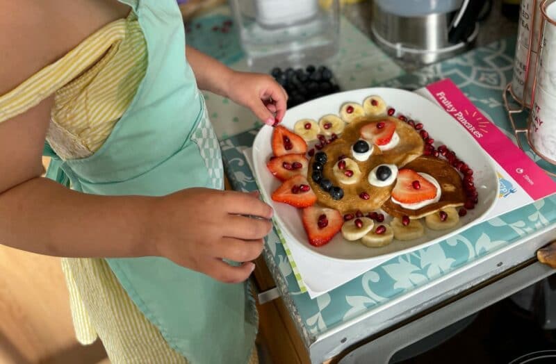 a child making pancakes