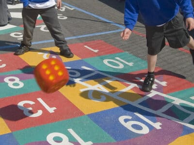 school children playing in a playground