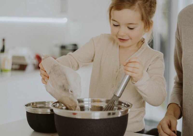 a girl doing some baking