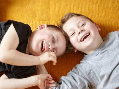 a photo of two children smiling